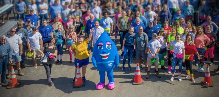 Misty The Mascot with a crowd of people